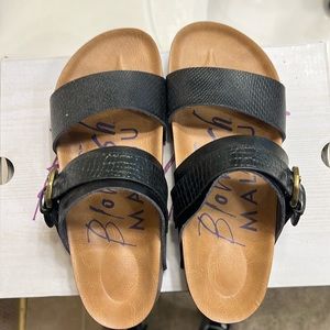 Like new sandals.  Worn 3-4 times.  Just too big for me.